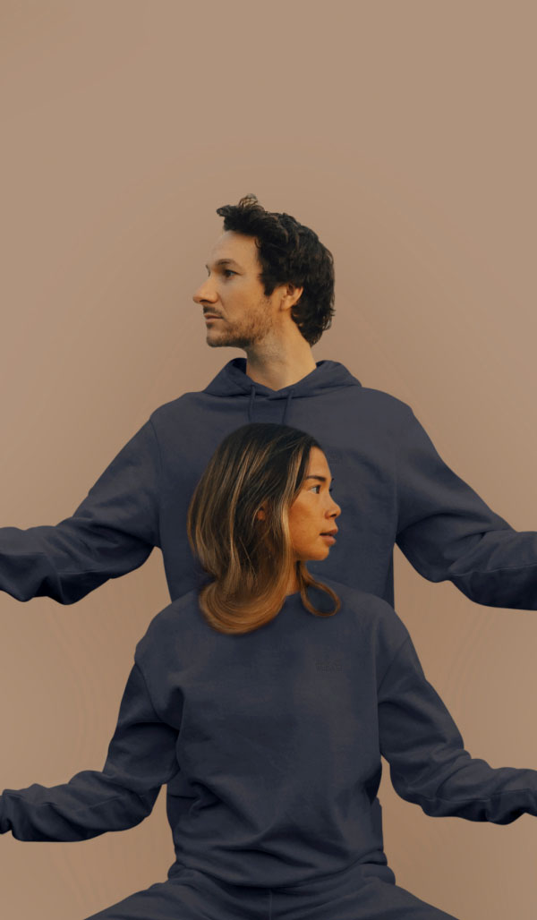 Man and woman raising their hands in the air